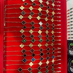 Elegant Gold and Multicolor Clover Bracelets